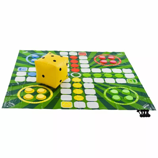 A jumbo size Giant Ludo 1.5m x 1.5m board game mat with a giant inflatable dice and four black pawns at the start position, isolated on a white background.