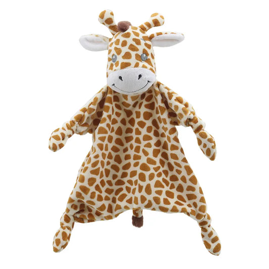 A plush toy resembling a giraffe with a soft, tan body covered in brown spots, floppy limbs, and a rounded snout with a friendly expression. This Comforter Giraffe Wilberry ECO has small, white horns and large, white ears. Made from 100% recycled plastic bottles, it's perfect for sensory play.