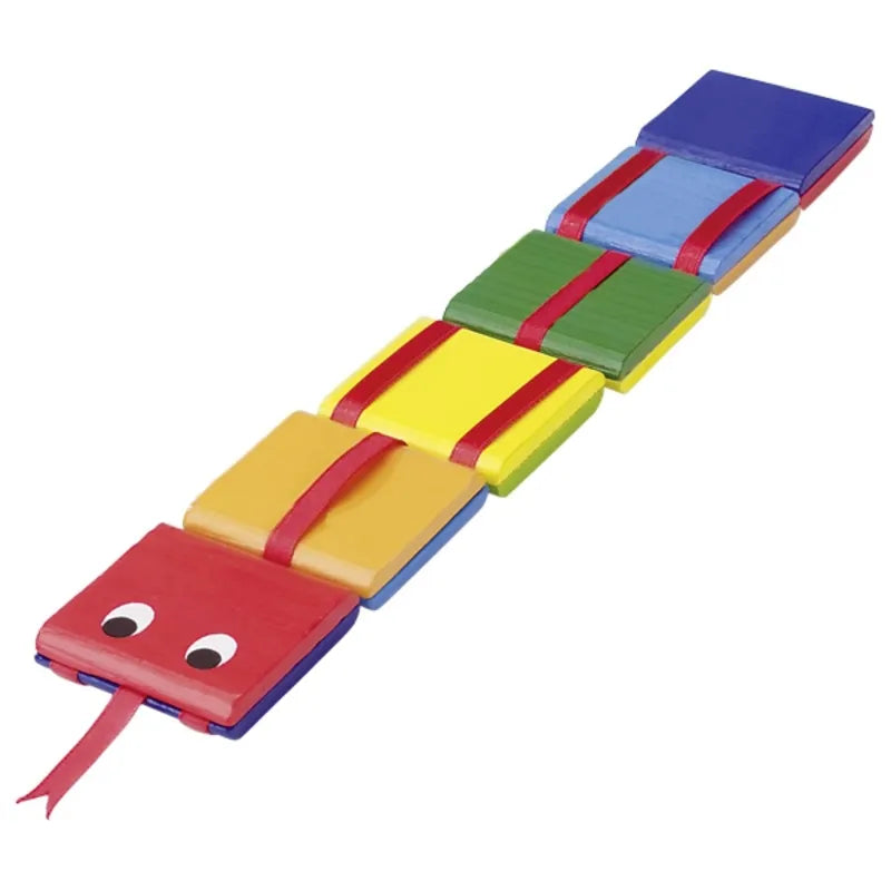 Introducing the Jacob’s Ladder with Eyes: a vibrant, soft play mat featuring sections in red, blue, yellow, and green designed to resemble a snake. Ideal as a stocking filler, it boasts large cartoon eyes on the head and a playful red tongue.