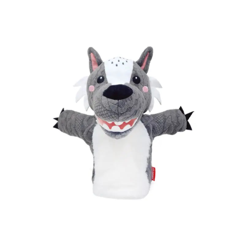 The Hand Puppet Wolf is gray and white with pink cheeks, a black nose, pointed ears, visible teeth, and outstretched arms—ideal for imaginative play or storytelling.