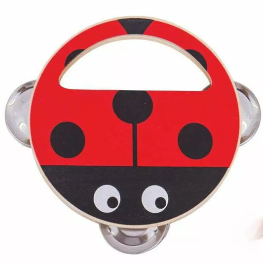 A red and black Bigjigs Hand Shaker Ladybird handle with two eyes and two metal grips, designed to look like a friendly insect face, serves as an early introduction to sound.