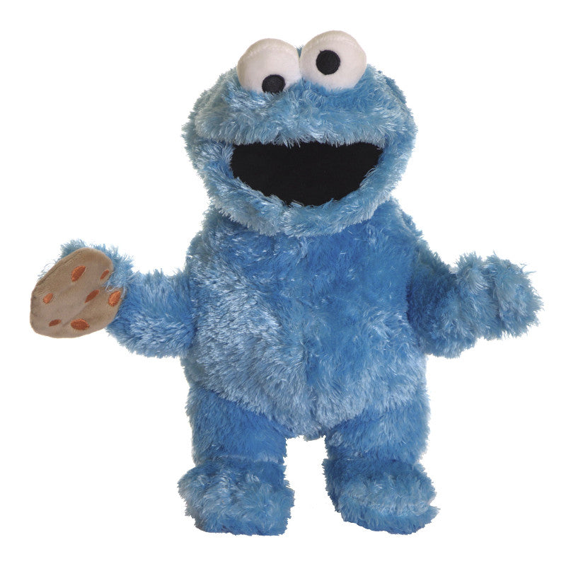A Living Puppets Cookie Monster Hand Puppet holding a cookie.
