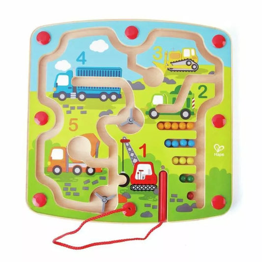 A Hape Construction & Number Maze board with cars and trucks on it.