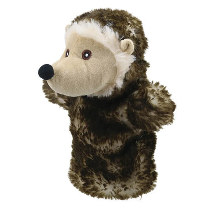 A plush ECO Puppet Buddies Hedgehog hand puppet made from recycled materials, featuring a furry brown and white exterior, rosy cheeks, sparkly red eyes, and a black nose.