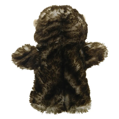A fluffy, dark-brown ECO Puppet Buddies Hedgehog Hand Puppet made from recycled materials, displayed on a white background, featuring distinct limbs and head but without any visible facial features.