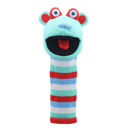 The Puppet Company Sockette Hope is a vibrant puppet with wide googly eyes, a big open mouth, and striped body in blue, red, white, and green. Its light blue face and red ears are made from recycled materials to support The Brain Tumour Charity.