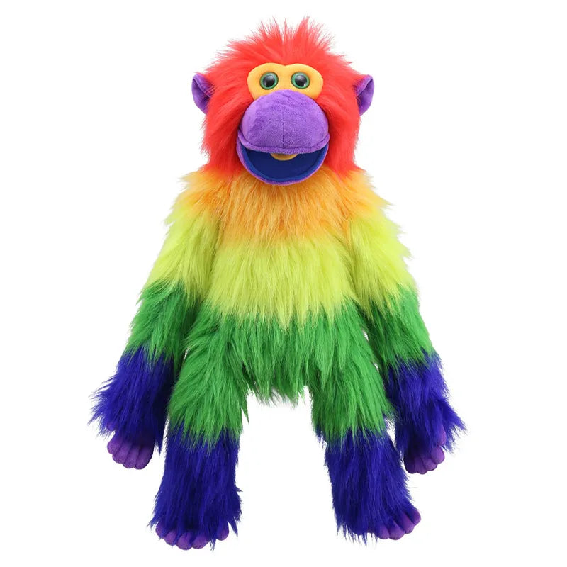 The Puppet Company Rainbow Monkey Hand Puppet boasts long, vibrant fur displaying a stunning gradient of red, orange, yellow, green, blue, and purple. It features large, round eyes and a wide open mouth with charming purple hands, feet, face, and ears. Ideal for playful moments and storytime adventures!