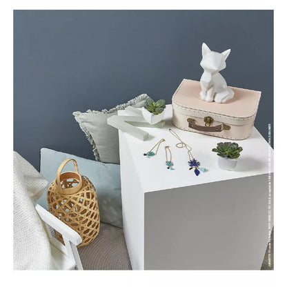 A Janod 3 Dreams Catchers Jewelry to Make sitting on top of a white table.