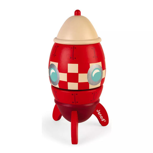 A red and white Janod Music Box Rocket with a face on it.