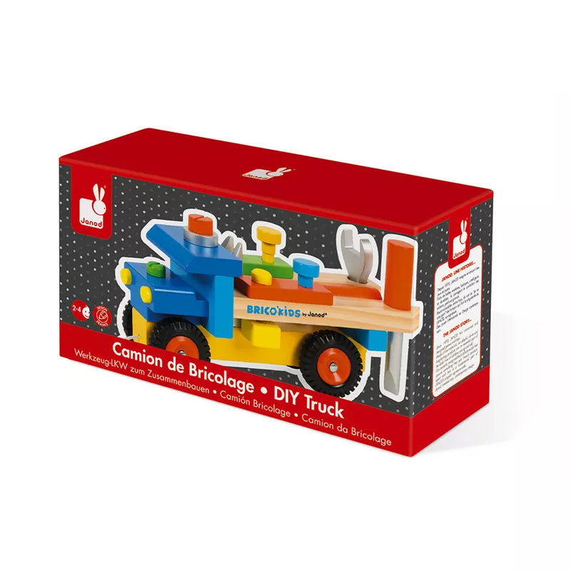 A box with a Janod Brico’Kids DIY Truck inside of it.
