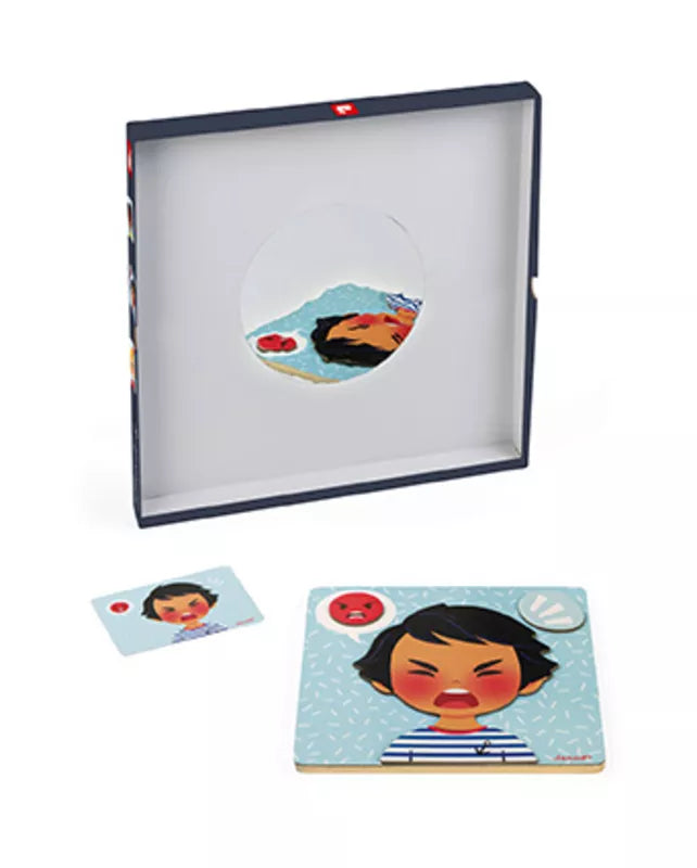 A Janod Emotions Magnetic Game with a picture of a girl inside of it.