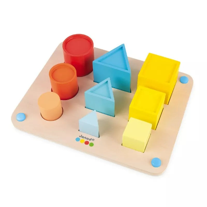 A Janod Essential - Volumes tray with shapes and shapes on it.