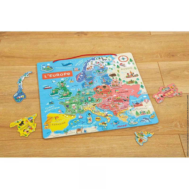 A Janod Magnetic European Map – French Only on a wooden floor.