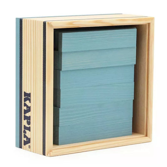 A KAPLA® 40 Coloured Planks Light Blue block inside a wooden block.