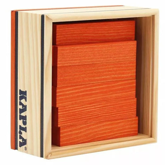 A set of KAPLA® 40 Coloured Planks Orange neatly stacked in a wooden storage box, designed as a construction game that stimulates creativity.