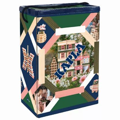 A laundry basket with a picture of a house and KAPLA® 200 Spring Box toy elements.