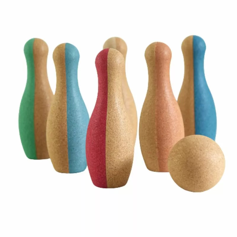 A group of four different colored Korko Bowling Sets sitting next to each other.
