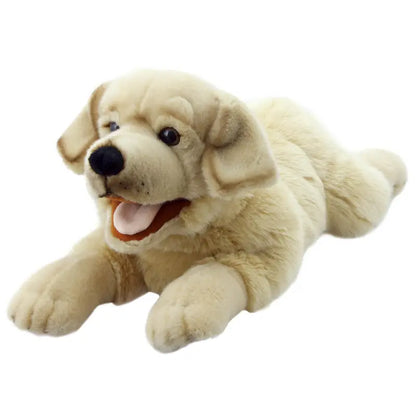 The Labrador Hand Puppet - Playful Puppies features a soft, light beige plush dog lying down with its mouth open in a happy expression and its front legs stretched out, making it perfect for cuddly play.