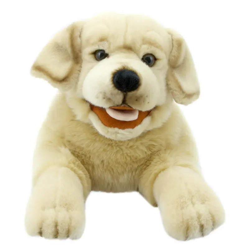 The Labrador Hand Puppet - Playful Puppies features a plush toy dog with light tan fur, brown eyes, and a black nose, lying down with front legs extended; it doubles as a charming hand puppet for playful fun.