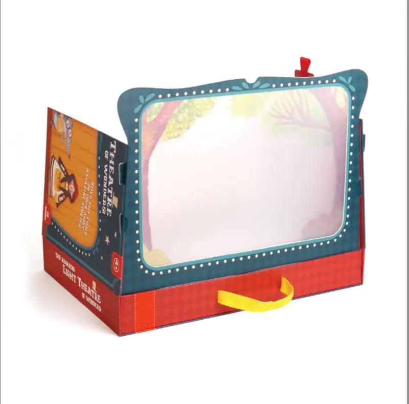 The Shadow Theatre – The Amazing Light Theatre of Wonders is a colorful cardboard puppet theater with a stage window, red and blue frame, illustrated lights, playful side artwork, carrying handle, and “Theatre Light Theater & Puppets” text.