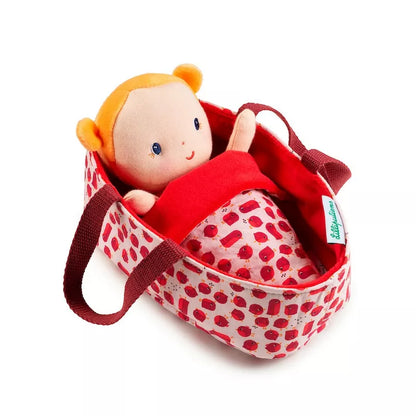 A Lilliputiens Agathe Baby First Doll in a red and white bag.