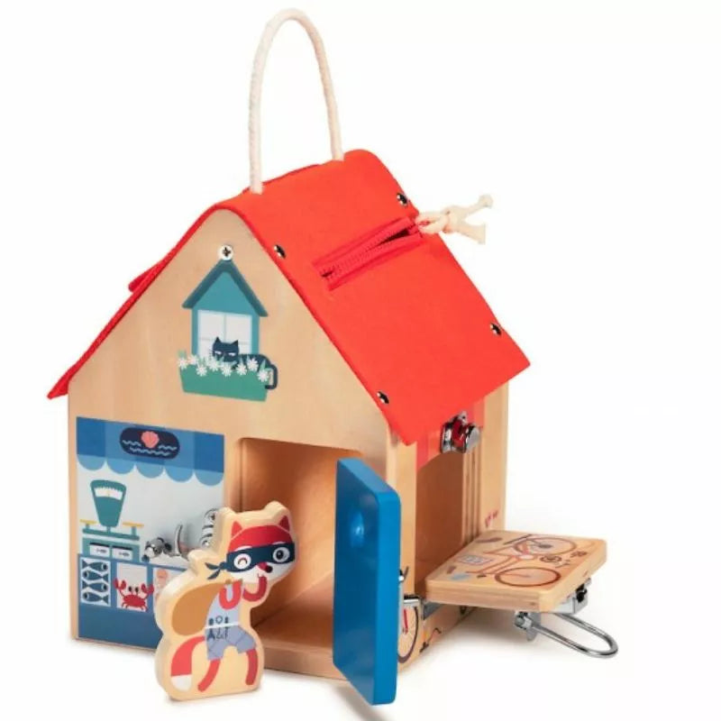 A Lilliputiens Learning House Multi-Locks Activity with intricate locks to develop fine-motor skills, including a playful cat inside.