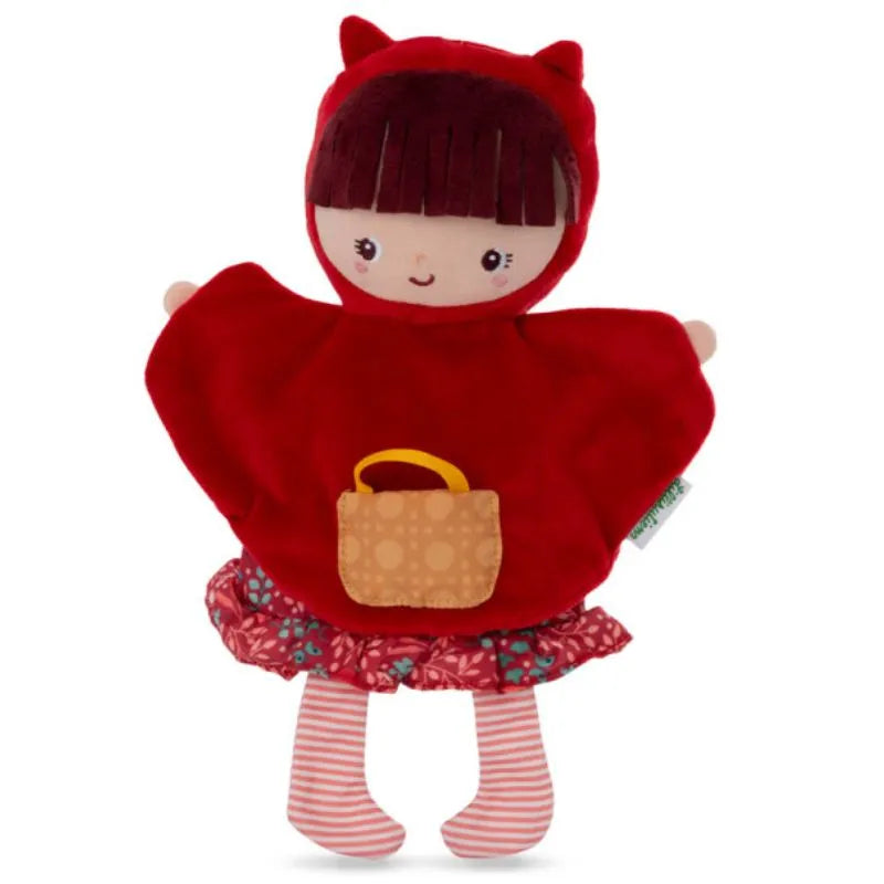 The Lilliputiens Red Riding Hood Handpuppet showcases a plush doll adorned in a red hooded cape, a patterned dress with a red and blue floral skirt, and pink striped tights. Ideal for imaginative play, it also includes a small brown handbag and features a cheerful facial expression. Furthermore, it's machine washable!