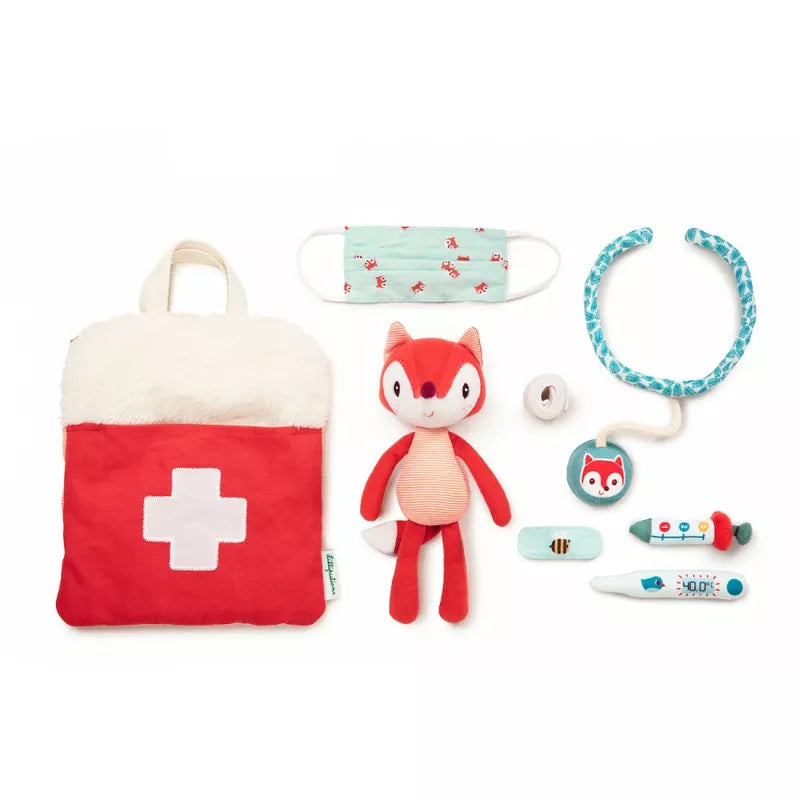 A Lilliputiens Little Doctor Bag with a stuffed animal and medical supplies.