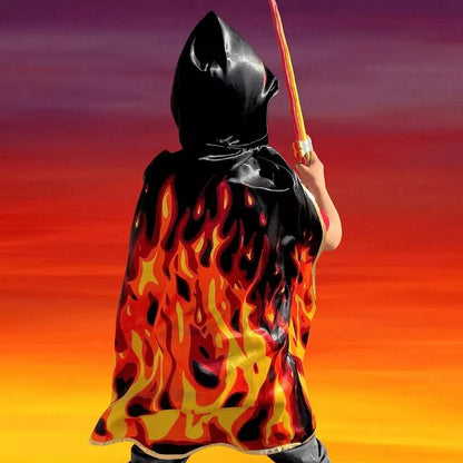 a child wearing a Liontouch Flame Cape holding a wand.