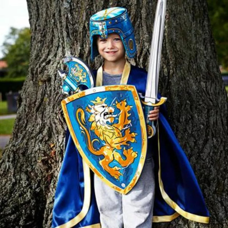 A boy dressed as a knight wearing a Liontouch Noble Knight Helmet.