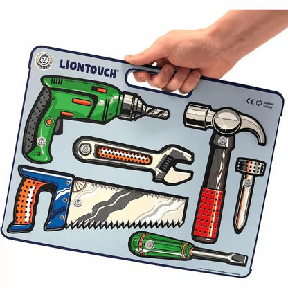 a hand holding a Liontouch Tool Play Set with tools on it.