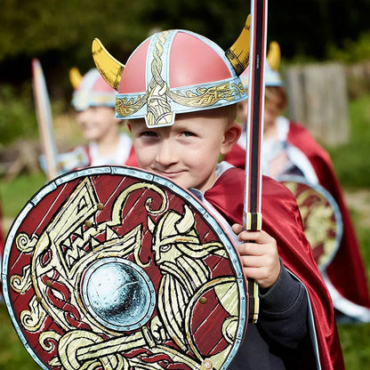 a group of children dressed as vikings holding Liontouch Viking Set Sword, Shield & Axe.