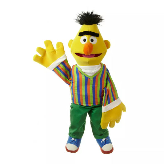 A large Living Puppets Bert 65cm Hand Puppet with black hair and green pants.