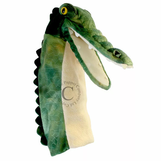 A Long Sleeved Hand Puppet with the head of a Crocodile. Made of soft and furry material, with a realistic looking face and is mouth moving.