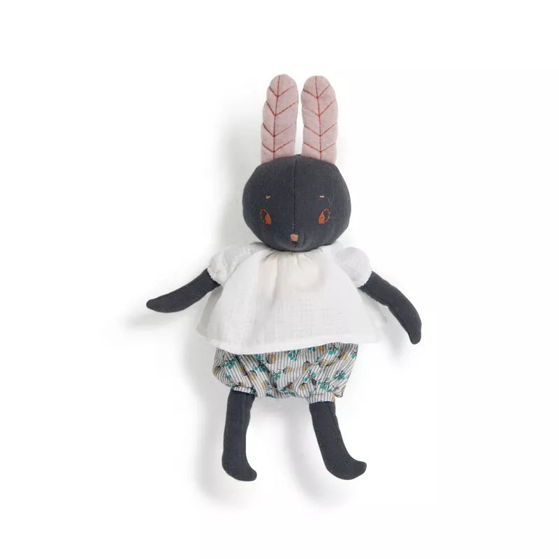 Moulin Roty Lune the Rabbit, a black and white stuffed animal wearing a white dress.
