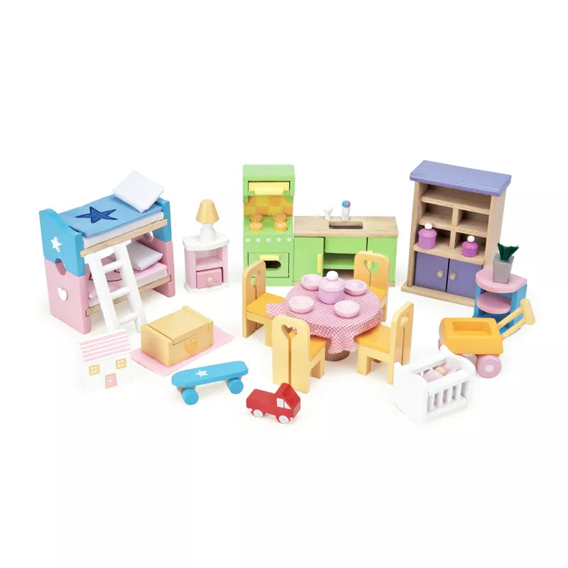 A Le Toy Van Starter Dollhouse Furniture Set with a table and chairs.
