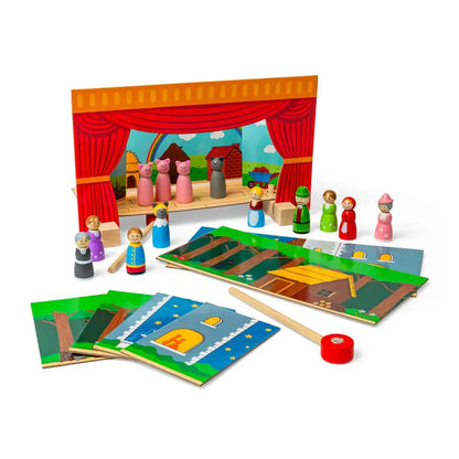 The Bigjigs Magnetic Theatre is a vibrant wooden playset featuring red curtains, magnetic puppet figurines, illustrated background cards, and a mallet—perfect for imaginative storytelling and role play.
