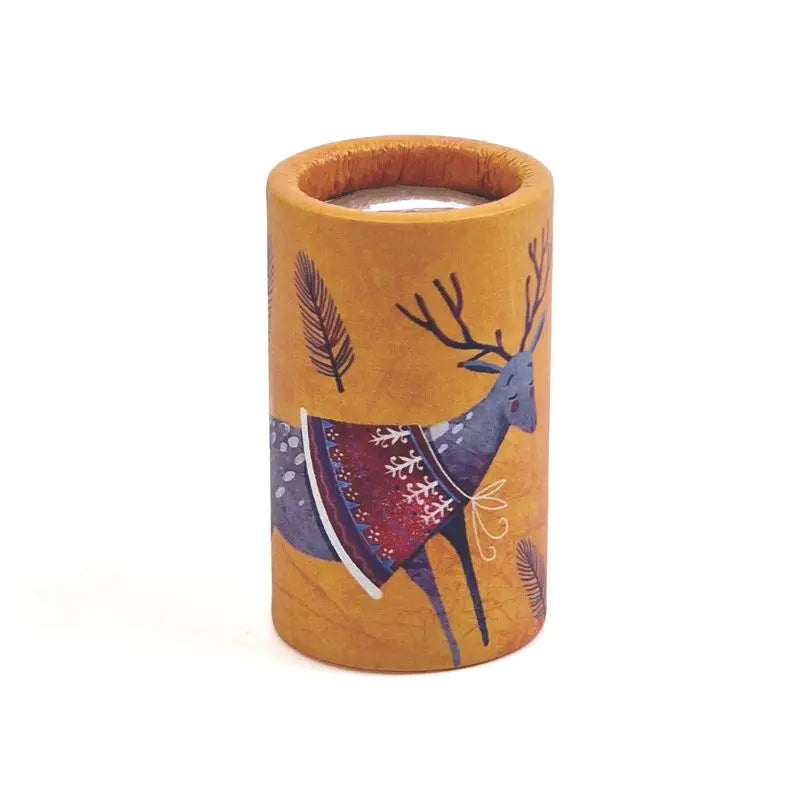 The Mini Kaleidoscope Deer features a yellow background with a reindeer in a patterned scarf and brown fern leaves—an ideal toy to spark curiosity during outdoor play.