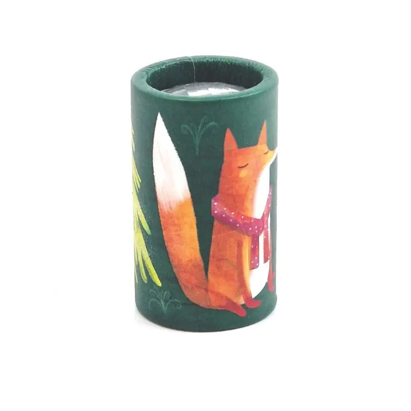 The Mini Kaleidoscope Fox is a green, nature-themed cylindrical roll featuring an illustration of an orange fox with closed eyes and a red scarf, sitting serenely next to a yellow-green tree.