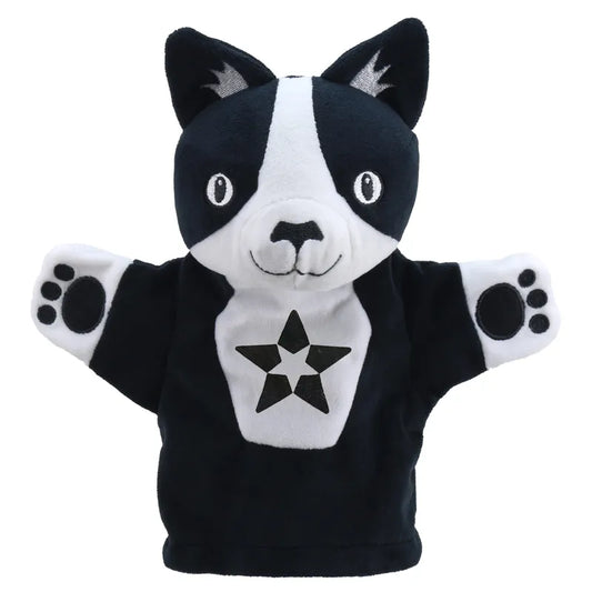 A hand puppet of My First Black & White Puppet Cat with a starred emblem on its chest, raised arms showing paw prints, and a playful expression.