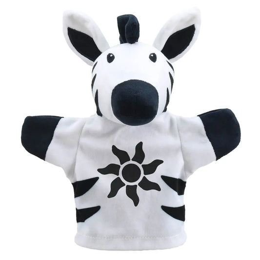 A plush My First Black & White Puppet Zebra with a sun design on the chest, featuring black and white stripes, and sitting upright against a white background, designed to stimulate the senses.