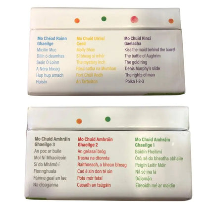 The Mini Gramophone Box Set includes two small cards listing traditional Irish songs in both Irish and English, divided by colored categories, each designed to look like a mini record player display featuring classic Irish music titles.