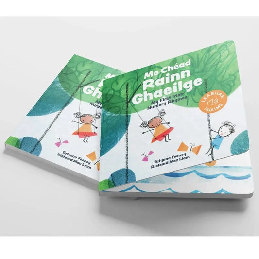 Mo Chéad Rainn Ghaeilge," a colorful Irish children’s book, features playful illustrations of kids swinging under trees, making it the perfect beginner rhyme book to spark early literacy on a bright white background.