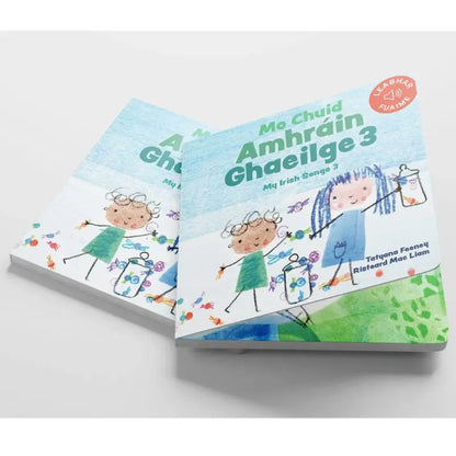 Mo Chuid Amhráin Ghaeilge 3" is an illustrated children's book with playful drawings, musical notes, and butterflies—perfect for introducing kids to Irish songs and musical learning.