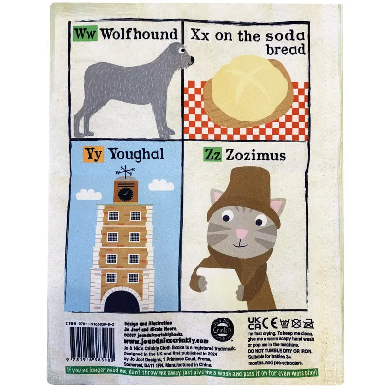 The Crinkly Cloth Book Ireland features four Irish-themed alphabet panels—Wolfhound, soda bread, Youghal's clock tower, and Zozimus—making it a charming illustrated baby gift.