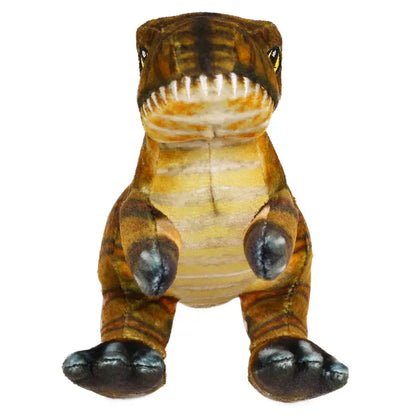 The Natural History Museum Small Tyrannosaurus Soft Toy is a brown and tan plush T. rex with big eyes, white-toothed smile, short arms, and large feet—ideal for dinosaur fans or young paleontologists.