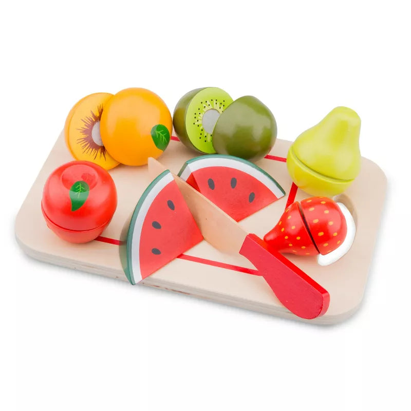 a New Classic Toys Cutting Meal Fruits board