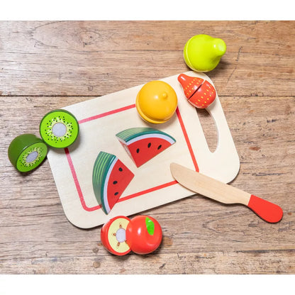 A New Classic Toys Cutting Meal Fruits wooden cutting board with fruits and vegetables on it.