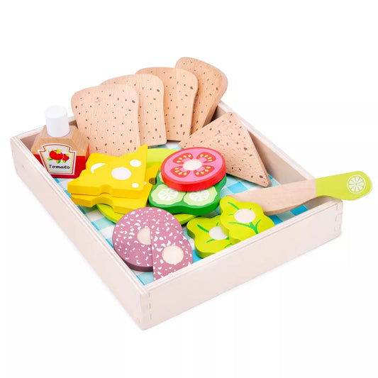 A New Classic Toys Cutting Meal - Picnic Box filled with different types of food.