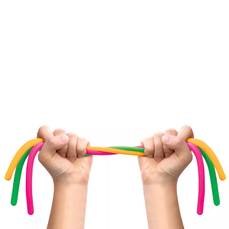 Two hands stretching a Noodlies Needoh with strands hanging down, isolated against a white background.